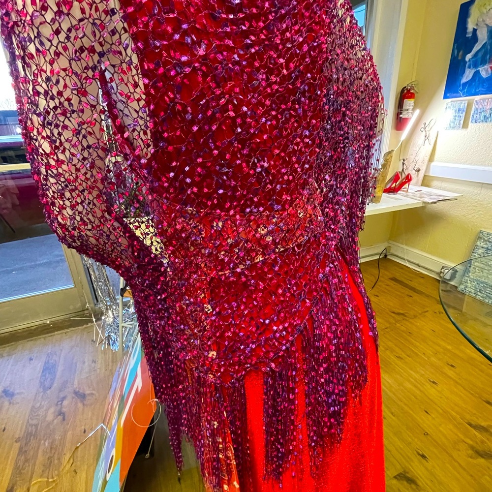 An elegant silk shawl with rich, vibrant colors! Add panache to your wardrobe!